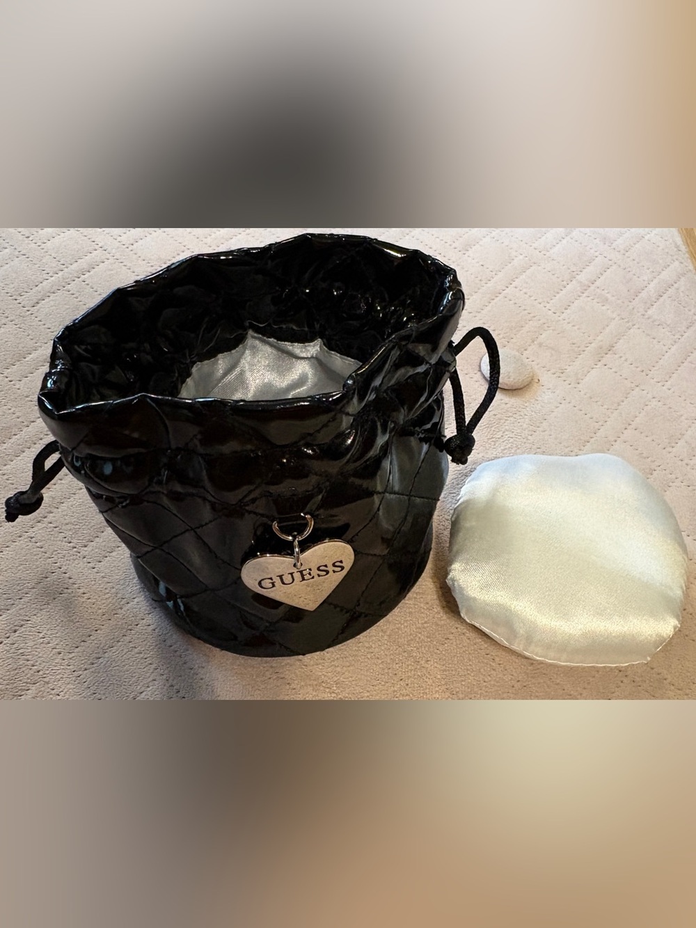 GUESS Black Patent Mini Drawstring pouch with cushion & Silver Guess Heart Charm
